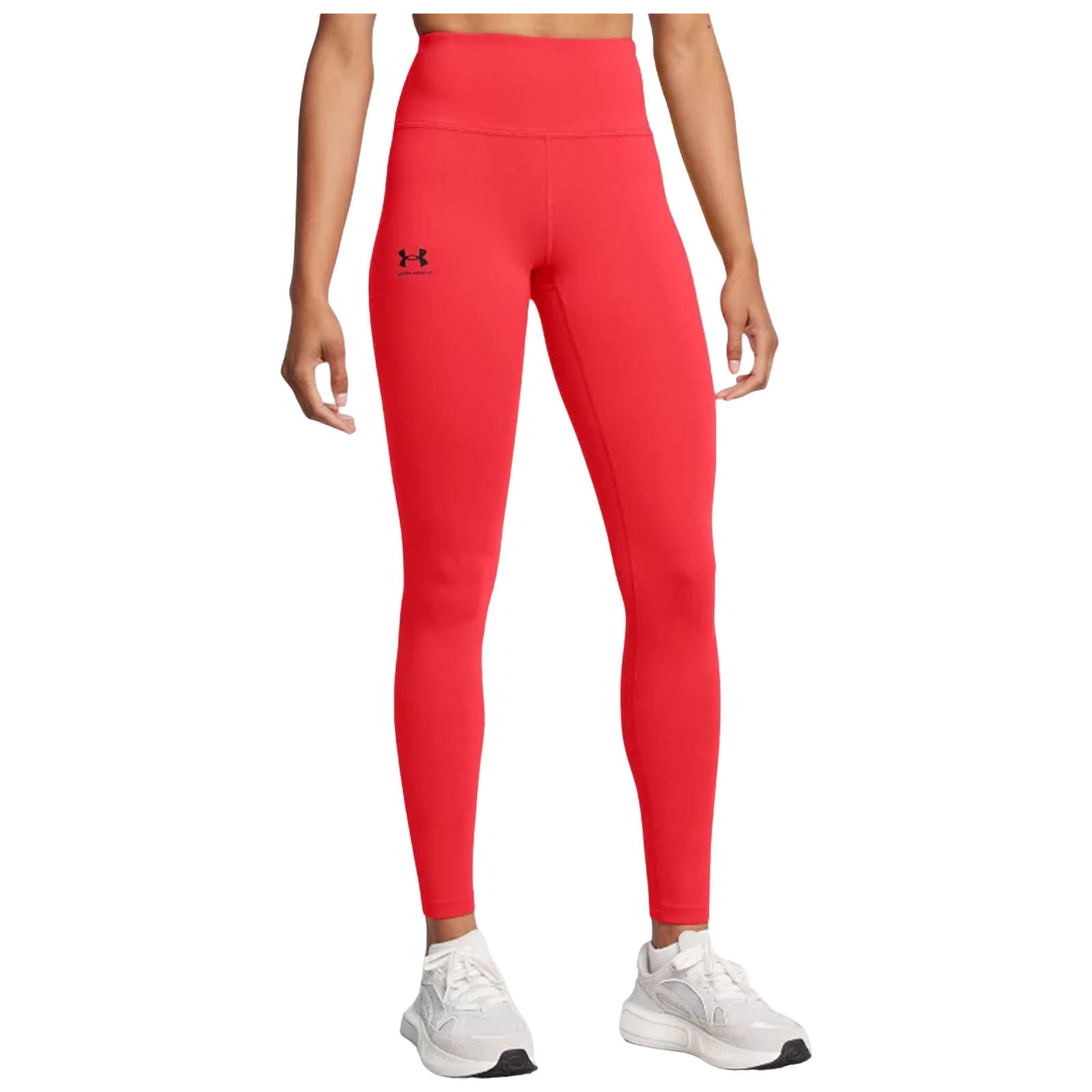 Red leggings are being worn by a model standing upright. The model's hands are relaxed at their sides. The background is plain and neutral, emphasizing the vibrant color of the leggings.