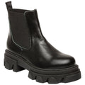 A black leather ankle boot features elastic side panels and a thick, chunky sole with a wavy design showcasing a modern style suitable for casual or edgy outfits.