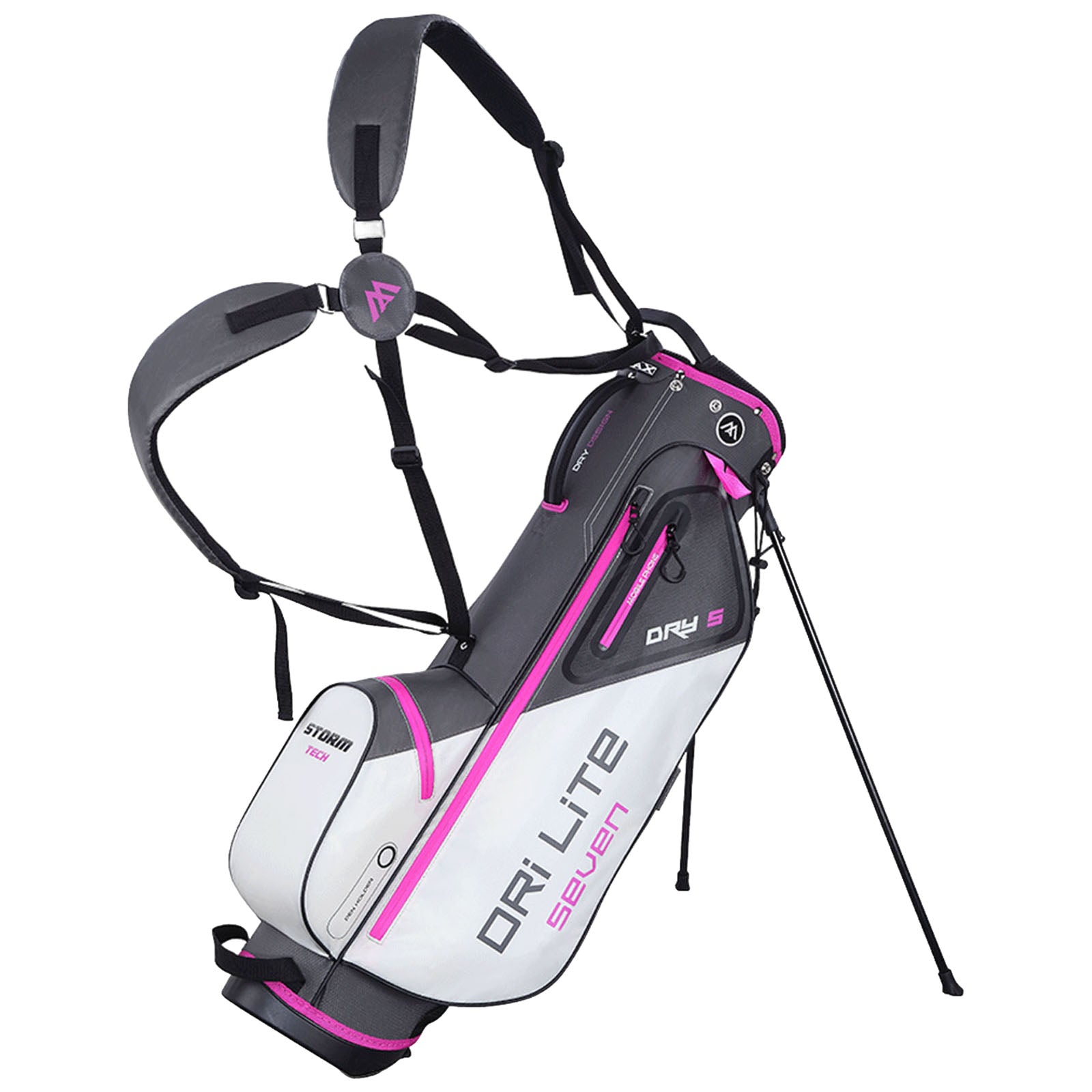 A golf bag with adjustable straps stands upright featuring a dual-color design predominantly white with pink accents and several zipped pockets useful for carrying golf equipment in an outdoor setting.