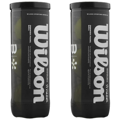 Two cylindrical containers are displayed upright containing padel balls The containers are black with white text that reads Wilson Premier Padel with additional descriptive text on durability and usage