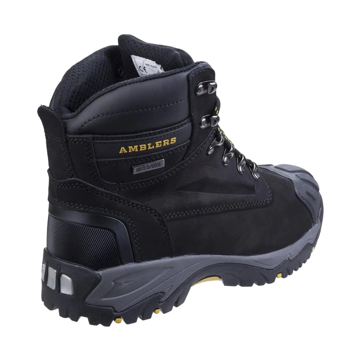 A black waterproof hiking boot stands upright showcasing metal eyelets and a rugged sole designed for traction in outdoor settings. The brand name AMBLERS is prominently displayed on the side.