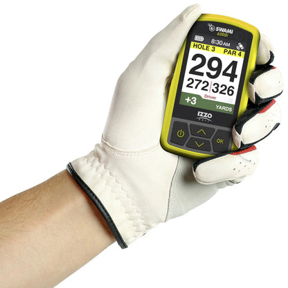 A hand wearing a white golf glove holds a yellow golf GPS device displaying the text HOLE 3 PAR 4 294 YARDS with additional yardage information indicating the context of golfing.