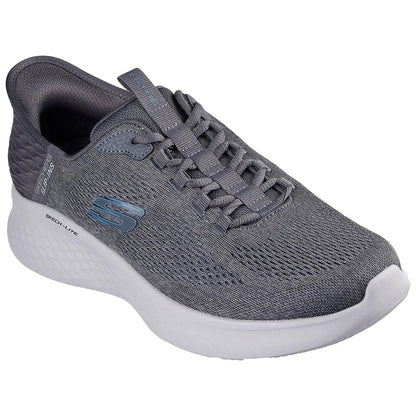 A gray athletic shoe is shown resting on a flat surface featuring a textured upper with laces and a cushioned sole designed for comfort and support during physical activities.