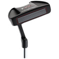 A black golf putter with a striped face sits upright on a metallic shaft featuring a rubber grip showcasing a sleek design suitable for use on a putting green.