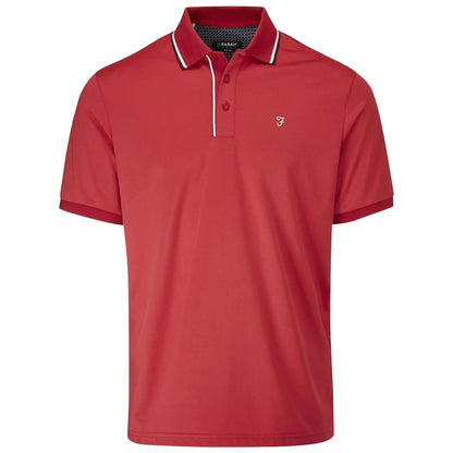 A red polo shirt is displayed hanging flat showcasing short sleeves a collar with a two-button placket and contrasting white trim along the collar and sleeves.