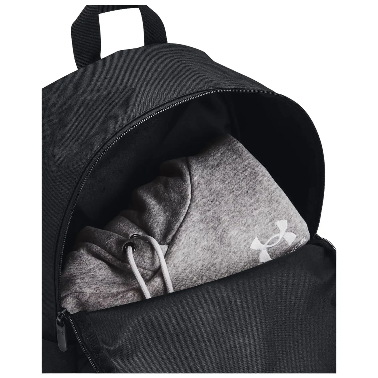 A black backpack contains a gray hooded sweatshirt visible at the opening the sweatshirt has drawstrings and a logo on the sleeve indicating its brand.