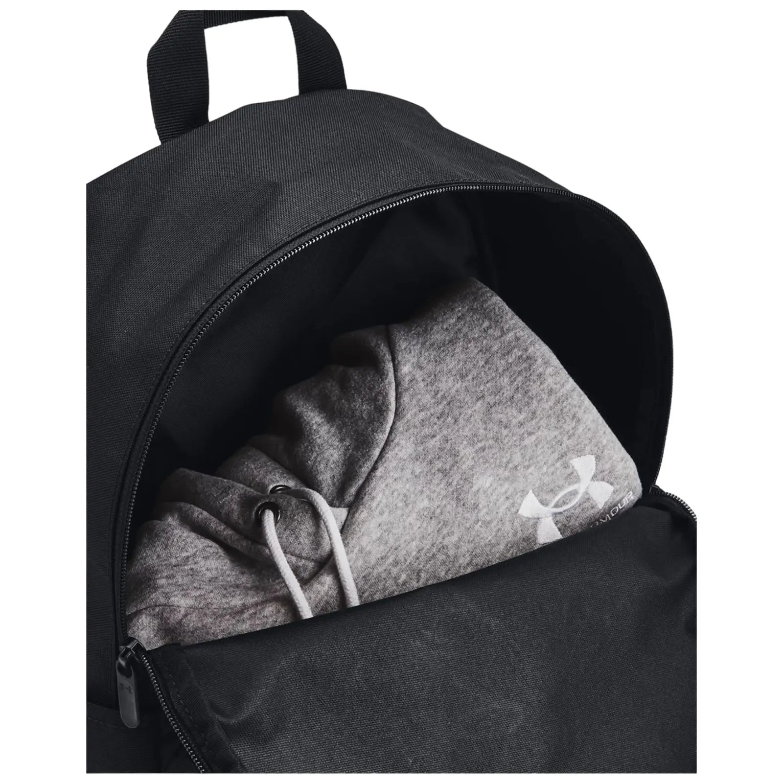 A black backpack contains a gray hooded sweatshirt visible at the opening the sweatshirt has drawstrings and a logo on the sleeve indicating its brand.