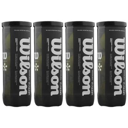 Four cylindrical black cans are stacked side by side featuring the brand name Wilson in bold white letters. Each can contains padel balls, suggesting they are for sports usage.