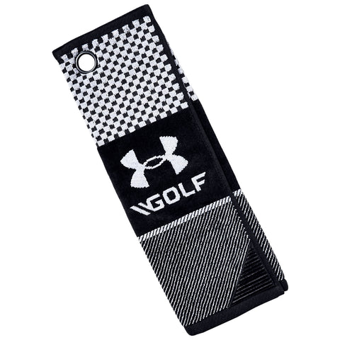 A black and white golf towel is displayed featuring a checkered pattern at the top and an Under Armour logo with the word GOLF at the center, suitable for cleaning golf equipment.