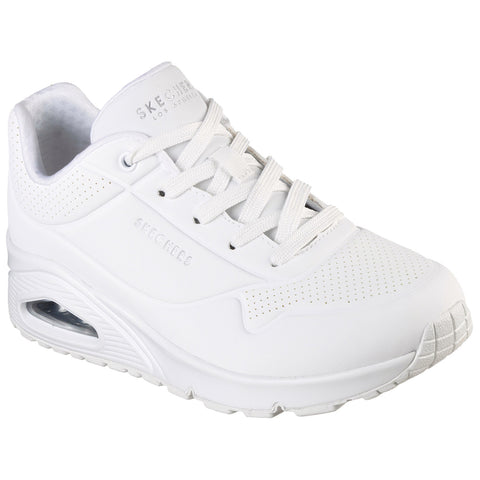 A white sneaker with a cushioned sole and perforated design sits upright showcasing laces and branding on the side set against a plain white background.