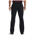 Black pants are worn by a person facing away. The setting suggests a casual or semi-formal environment, indicated by the choice of clothing and posture.