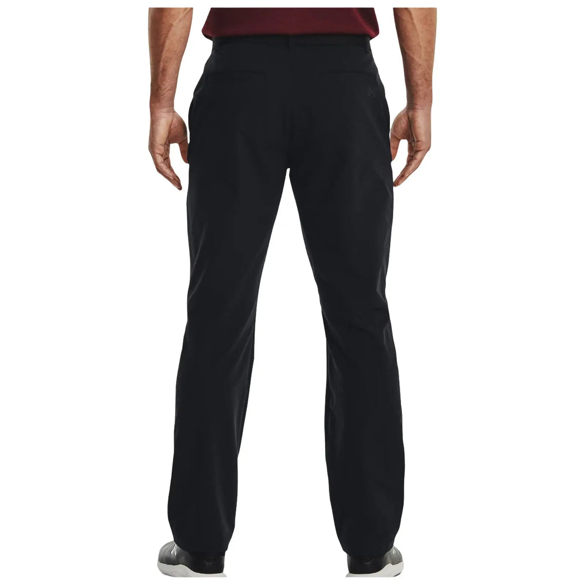 Black pants are worn by a person facing away. The setting suggests a casual or semi-formal environment, indicated by the choice of clothing and posture.