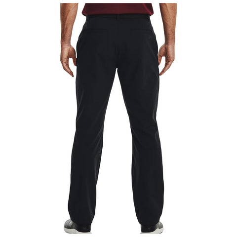Black pants are worn by a person facing away. The setting suggests a casual or semi-formal environment, indicated by the choice of clothing and posture.