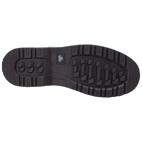 A black rubber boot sole is displayed with deep treads and ridges designed for grip while the context suggests it is intended for outdoor or work environments.
