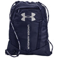 A navy blue backpack features a large silver Under Armour logo and the brand name printed vertically. It has a drawstring closure and adjustable straps for carrying.