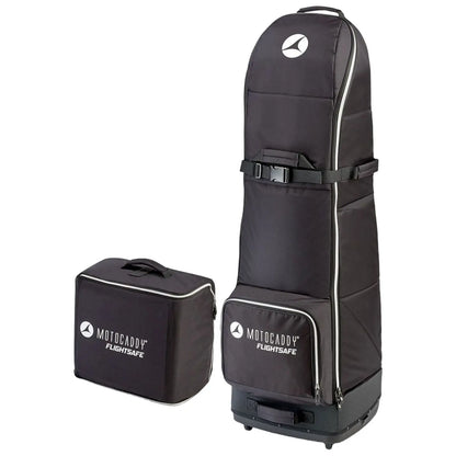 A tall black golf travel bag with a smooth exterior stands upright next to a smaller rectangular bag both featuring the Motocaddy Flightsafe logo designed for protecting golf equipment during travel.