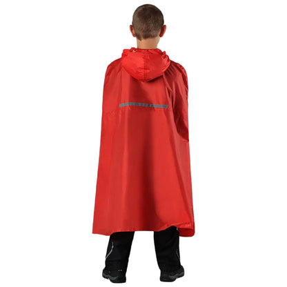 A child wears a red rain cape with a hood standing with their back turned while the surrounding context appears simplistic and neutral, focusing on the garment's design and color.