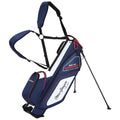 A golf bag with a stand is displayed featuring dual straps for carrying and compartments for storing golf clubs and accessories in a blue and white design with red accents