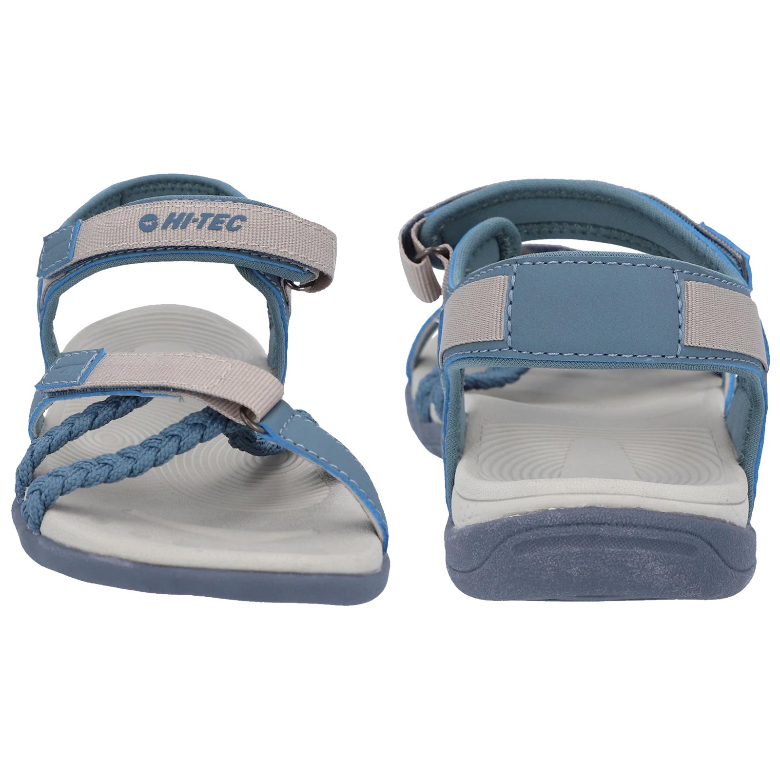 Blue sandals with braided straps are displayed upright showing their flat soles and adjustable straps indicating a casual and comfortable design suitable for outdoor use.