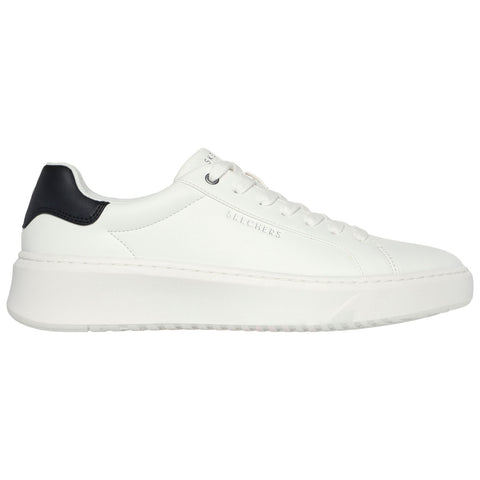 A white sneaker with a black heel cap is viewed from the side. It features a thick sole and is laced up, suggesting it is designed for casual wear.