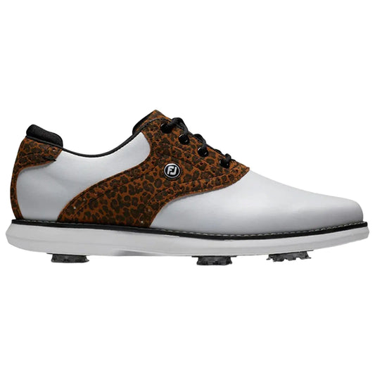 A golf shoe with a white body and a brown leopard-print upper sits on a flat surface featuring black laces and a rubber sole with visible spikes for traction.
