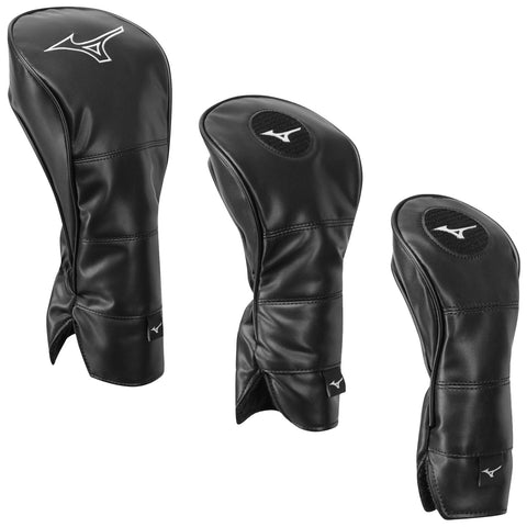 Three black golf club headcovers are positioned upright with smooth surfaces and a logo on each. The setting is neutral with no other objects or context visible.