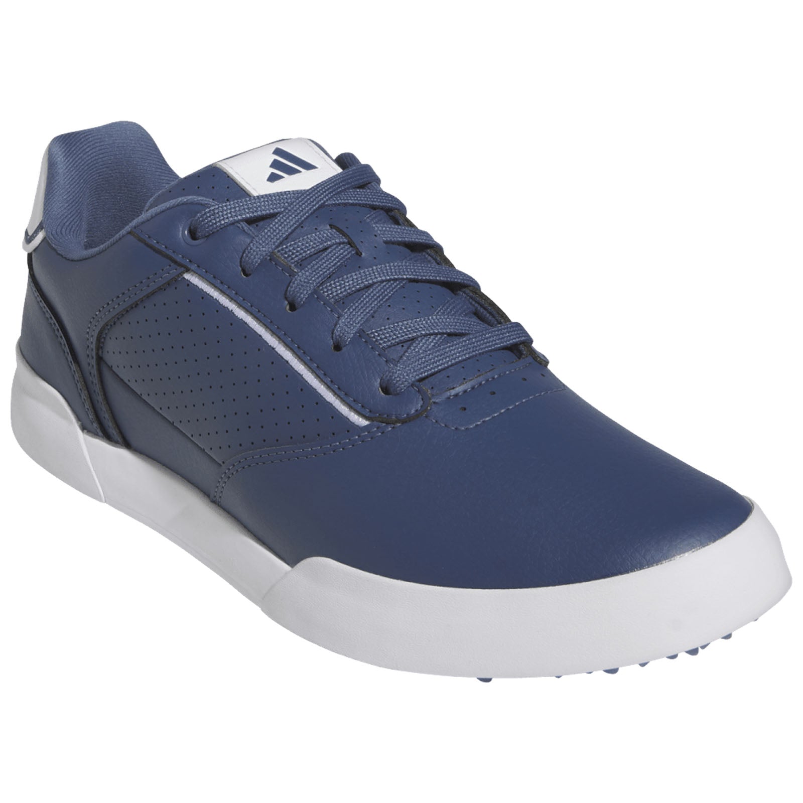 A navy blue sneaker features a smooth leather upper with perforations for breathability and a white sole. The laces are tied, positioned on a neutral background.