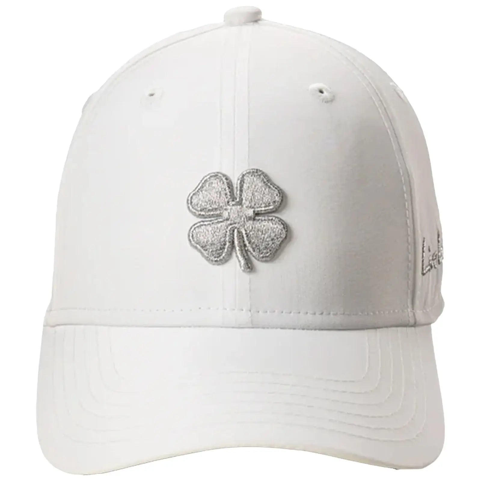 A white baseball cap with a silver embroidered four-leaf clover on the front is displayed against a simple background highlighting its design and features.