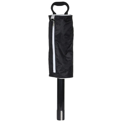 A black umbrella is standing upright with a cylindrical handle and a zipped cover. The cover is partially zipped, revealing the umbrella's structure in a neutral background.