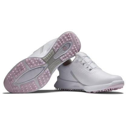 White golf shoes feature a smooth upper with perforations for breathability and a spiked outsole for traction designed for use on golf courses against a clean white background.
