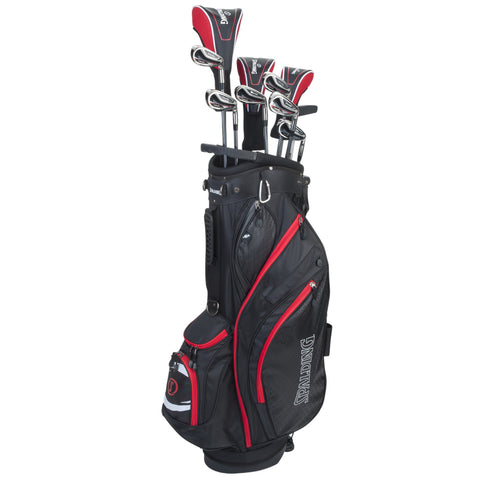 A black golf bag stands upright with several golf clubs partially inserted. It features red accents and multiple pockets, suggesting preparation for a round of golf in an outdoor setting.
