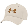 A beige baseball cap features a prominently stitched brown Under Armour logo on the front. It is designed for casual wear and outdoor activities in various environments.