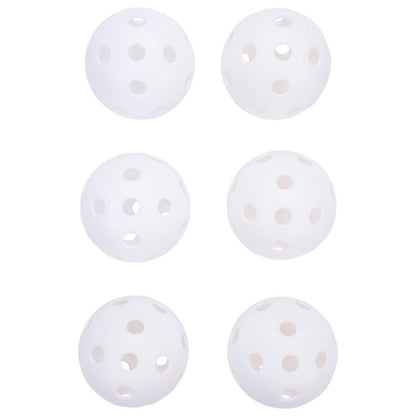 Six white plastic balls with multiple holes are arranged in two rows of three on a plain background, suggesting they are used for playing sports like pickleball or badminton.