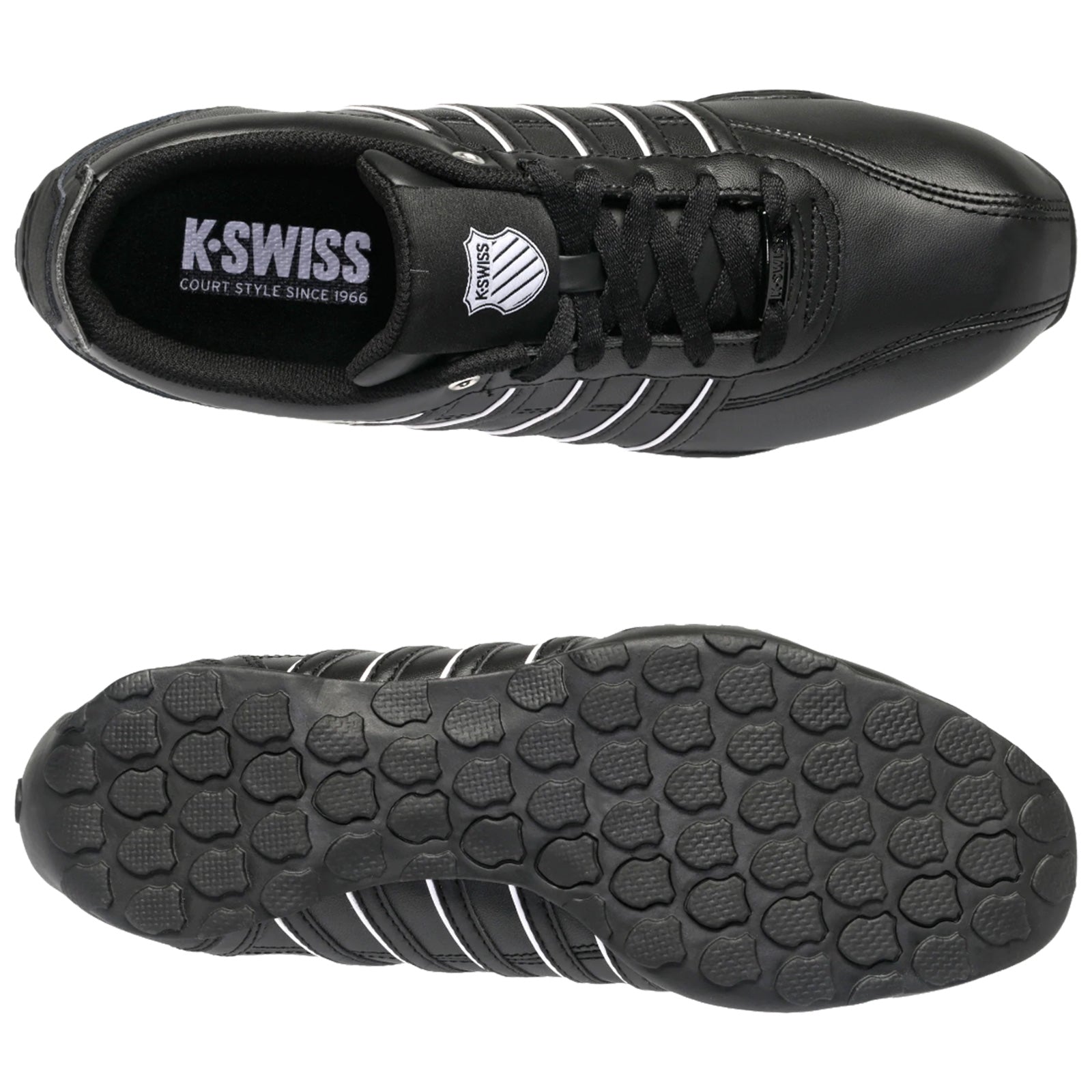 A black tennis shoe with white stripes is displayed prominently with the top view showcasing laces and an inner label. The sole features a textured rubber pattern for grip.