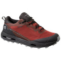 A red and black waterproof hiking shoe is positioned prominently. It features a rugged sole designed for traction on various terrains and is set against a plain white background.