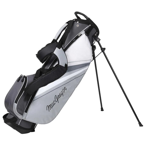 A golf bag stands upright on three legs with a grey and white design featuring a logo. It has a carrying strap and multiple compartments for carrying golf clubs and accessories.