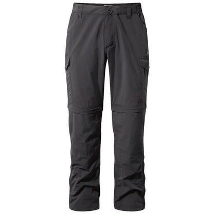 Black outdoor pants with zip-off legs are displayed standing upright featuring multiple pockets designed for versatility and comfort in an outdoor environment suitable for hiking or casual wear.