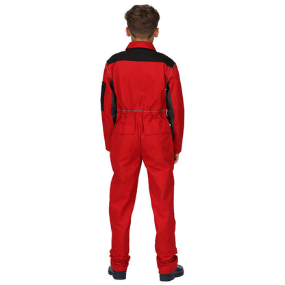 A child stands facing away, wearing a red jumpsuit with black accents and sturdy black footwear, positioned against a plain white background. The outfit is designed for practical purposes.