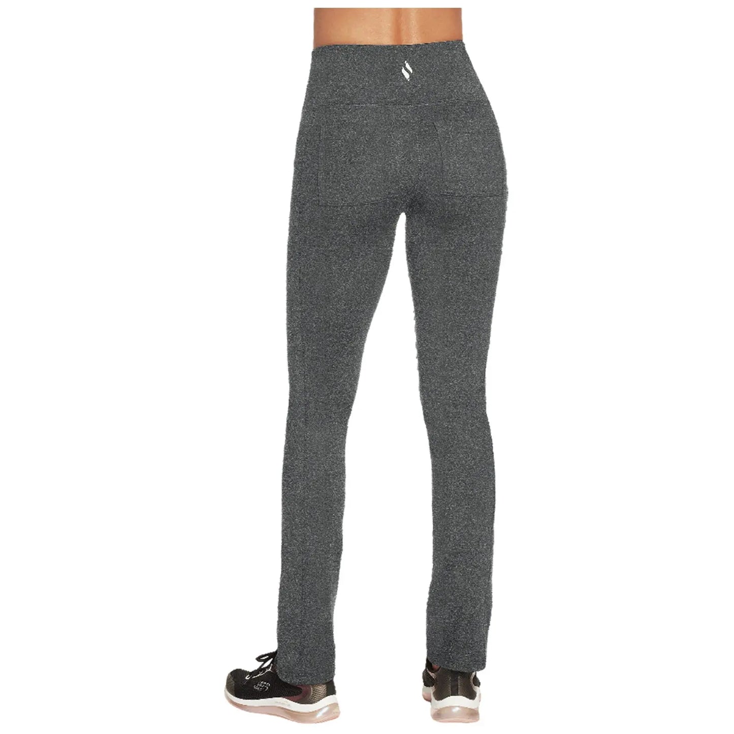 High-waisted gray leggings are worn by a person who is standing still in a relaxed pose in a casual indoor setting with soft lighting and neutral background.