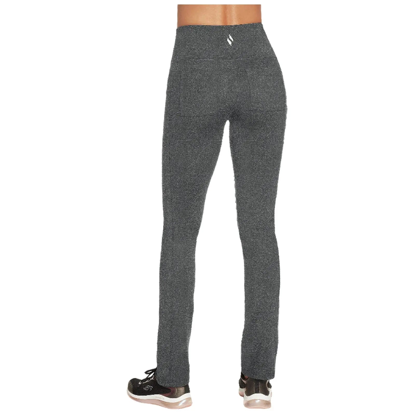 High-waisted gray leggings are worn by a person who is standing still in a relaxed pose in a casual indoor setting with soft lighting and neutral background.