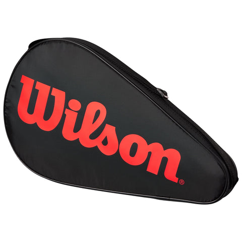 A black tennis racquet bag with a triangular shape displays a prominent red "Wilson" logo on its surface it is designed for carrying and protecting a tennis racquet