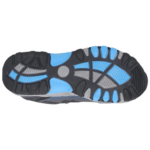 A shoe sole featuring a black rubber base with blue and gray accents is displayed above a flat surface showing tread patterns designed for traction and stability in various conditions.