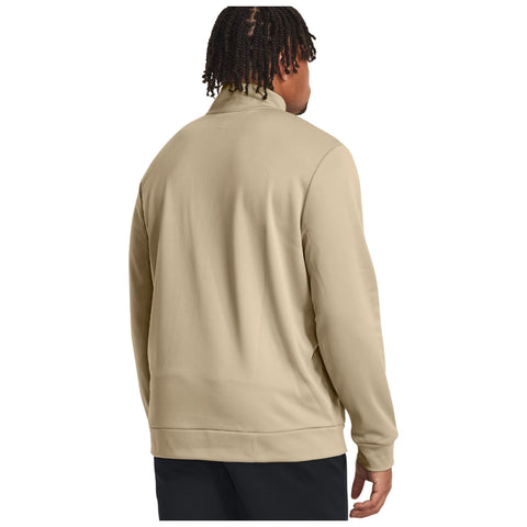 A person wearing a light beige jacket faces away with their hands resting at their sides against a plain white background. The jacket has a high collar and a relaxed fit.
