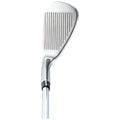 A golf club is positioned vertically showcasing the clubface with grooves designed for striking a golf ball the sleek metallic shaft extends downward suggesting a focus on precision and quality in golfing equipment.