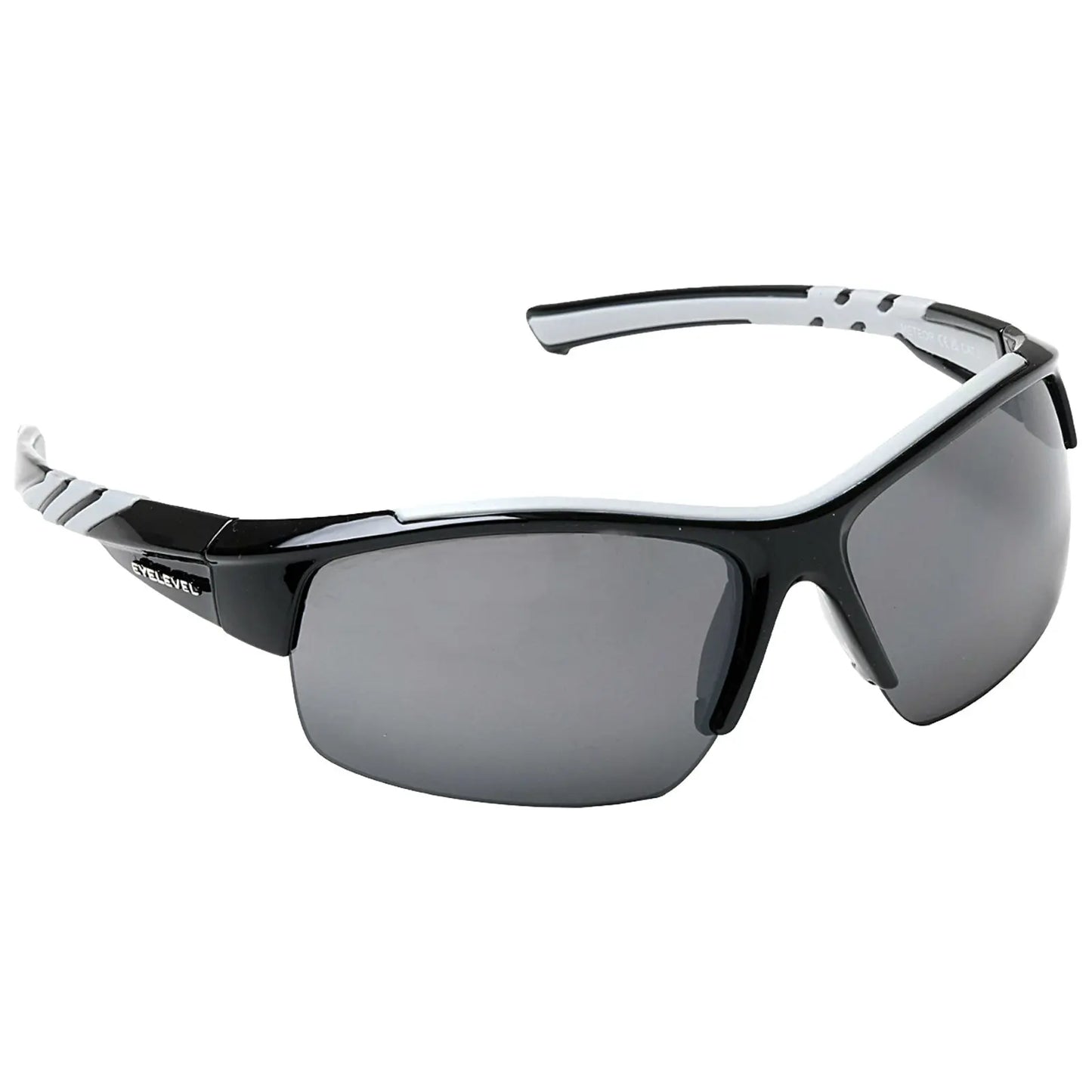 Black framed sunglasses with gray lenses rest at an angle showcasing their sleek design and white accents on the temples against a neutral background.