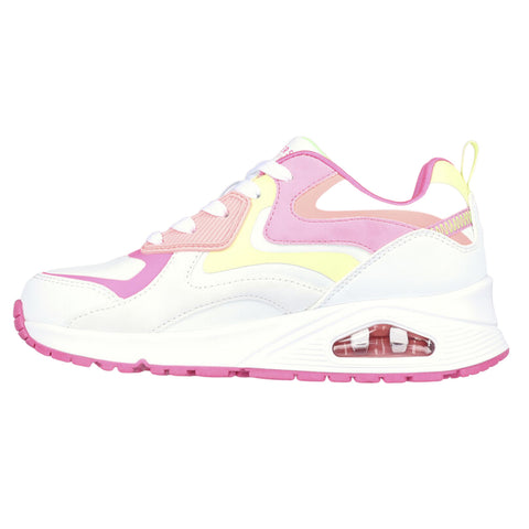A sneaker with a white base features pink and yellow accents. It has a chunky sole with visible air cushioning and white laces, suitable for casual wear and light exercise.