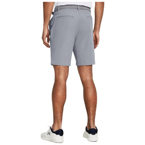 A person stands wearing gray shorts and a white shirt with a patterned belt and white shoes, visible from the back in a neutral background, showcasing casual clothing style.