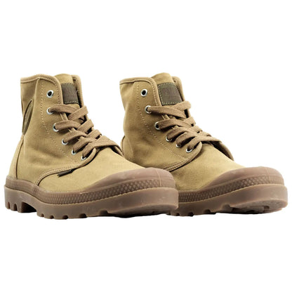 Brown canvas boots with high tops are positioned side by side displaying laces and rubber soles suitable for outdoor activities against a plain white background