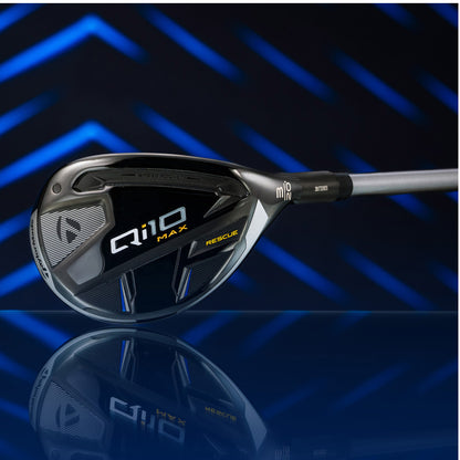 A golf club head is showcased at an angle with the brand name Q10 MAX and the word RESCUE visible on its glossy surface reflecting light against a dark background with blue diagonal lines.