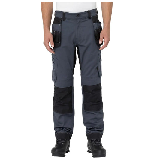Gray work pants with multiple pockets are being worn by a person standing upright in a neutral position. The pants have reinforced black sections at the knees and are paired with black boots.